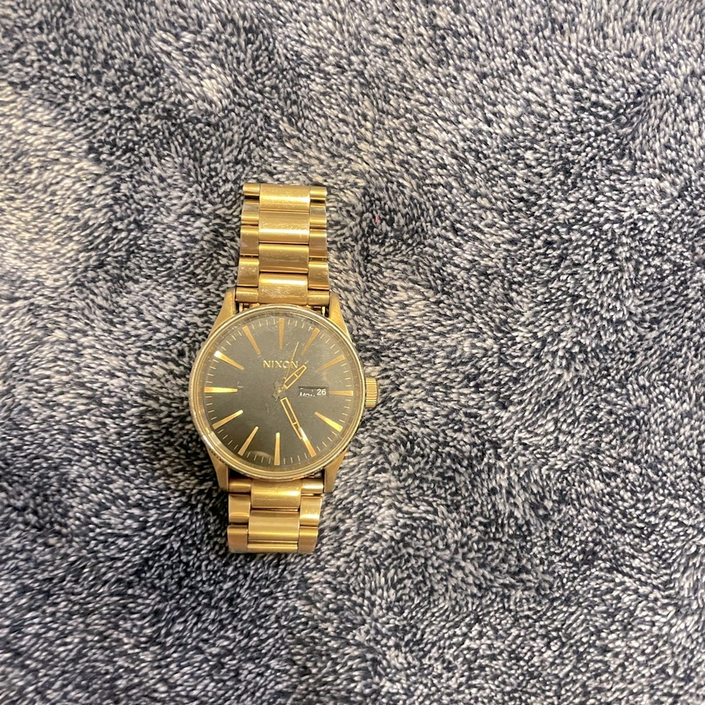 Gold Nixon watch